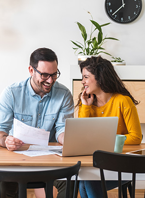 Couple looking at a computer