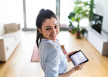 Woman walking using phone.