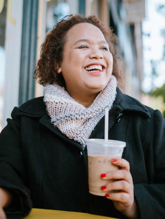 woman with iced coffee